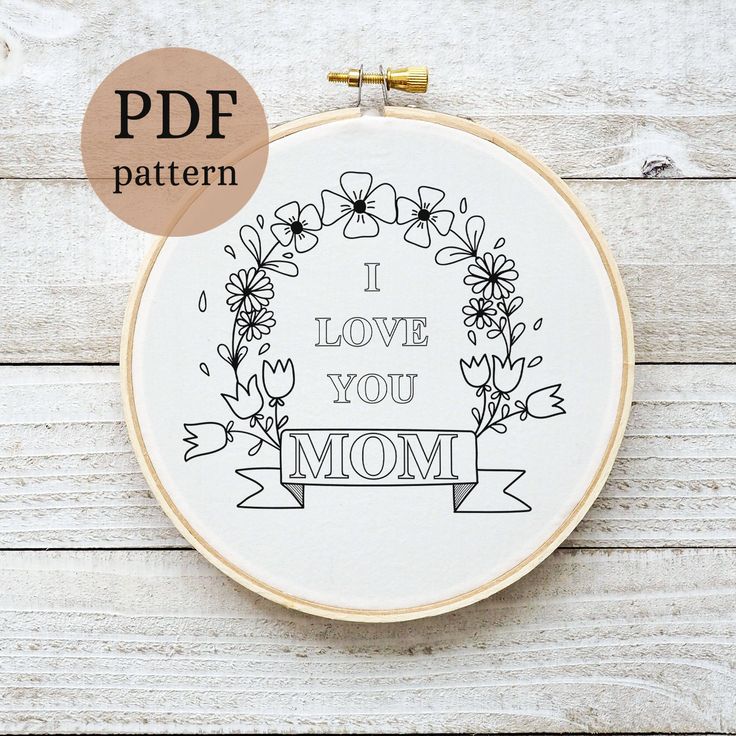 a cross stitch pattern with the words i love you mom in black and white on it