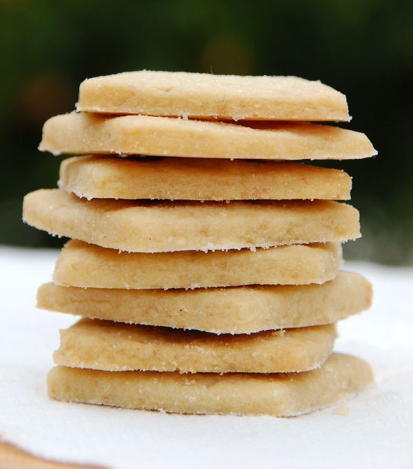 a stack of cookies sitting on top of a white table