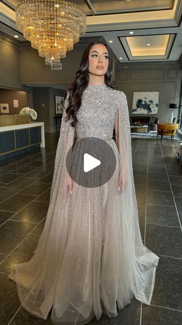 Iyza Belaar on Instagram: "#fitcheck in the Noor Modest Long Drape Sleeves Beaded A-line Gown ✨💎 Experience understated elegance with the Noor Modest Long Drape Sleeves Beaded A-line Gown by Iyza Belaar. This evening gown features a unique blend of modesty and glamour, with long cape sleeves gracefully touching the floor and a delicate beaded bodice that seamlessly transitions into a tulle beaded skirt. Hand-embellished with meticulous attention to detail, this gown is a captivating choice for those seeking timeless sophistication at formal events. #modestfashion #modest #longsleeve #longsleevedress #modesteveninggown #modesteveningdress #habibidress #afghan #arabdress #abayafashion #muslimdress #customdress #arabwedding #fashion #dressesonline #dresses #weship #instashop #onlineshopping Modest Evening Gowns, Arab Dress, Long Drapes, Modest Evening Dress, Beaded Skirt, Muslim Dress, Drape Sleeves, Cape Sleeves, Beaded Bodice