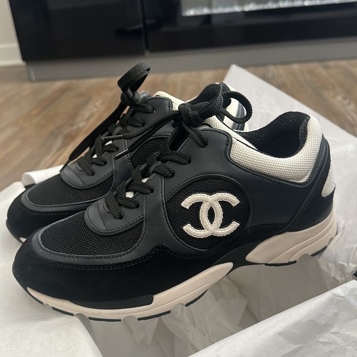 Pre Loved But In Excellent Condition Chanel Sneakers In A Size 38. Sneakers Come With Everything Pictured, Two Shoe Dust Bags, An Extra Pair Of Shoe Laces, And The Original Box. Shoes Chanel, Chanel Sneakers, Chanel Shoes, Black Cream, Womens Shoes Sneakers, Shoe Laces, The Original, Original Box, Dust Bag