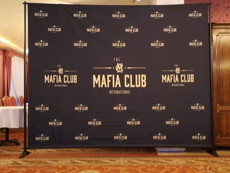 a black backdrop with the words mata club on it