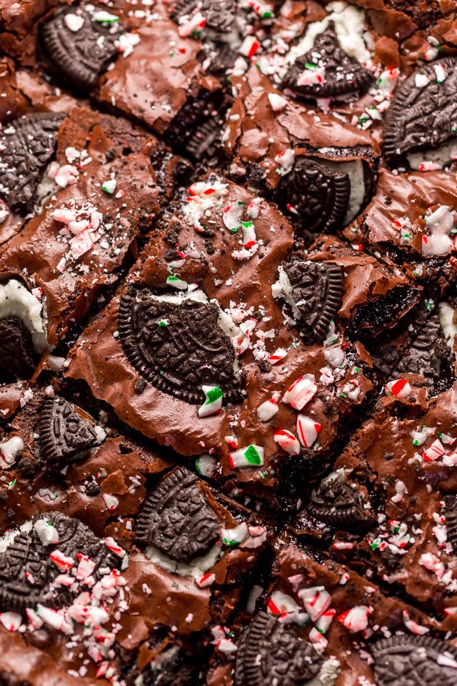 an oreo cookie and peppermint barkle dessert with chocolate chips, marshmallows, and candy canes