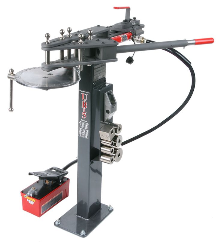 a machine that is sitting on top of a metal stand with tools attached to it