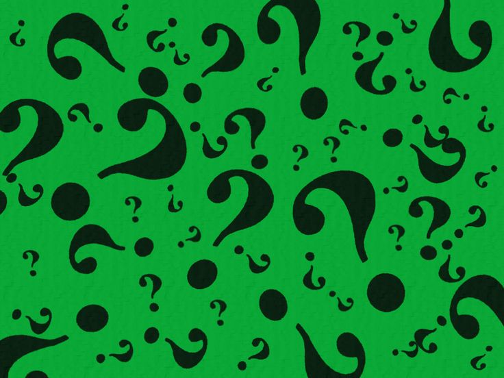 black question marks on a green background