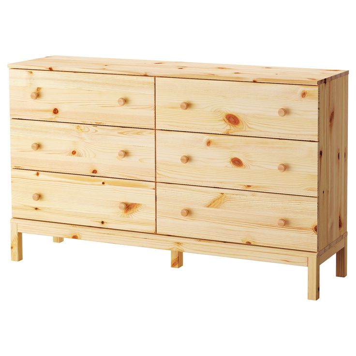 a large wooden dresser with four drawers