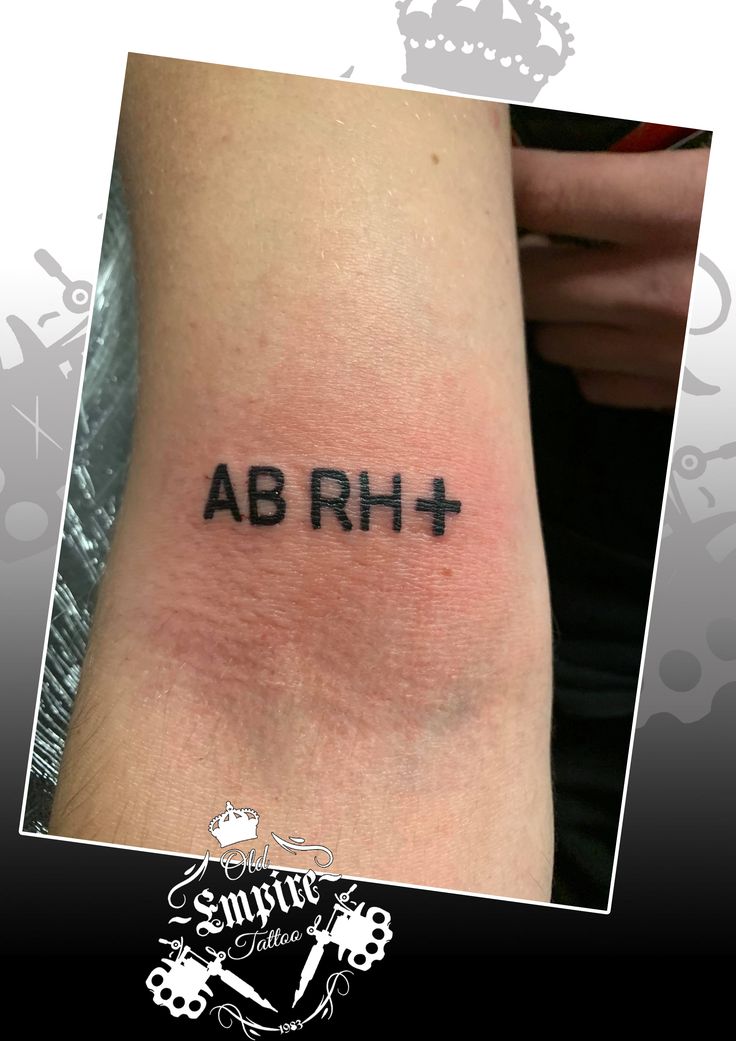 a tattoo with the word ab rh on it's left arm and an image of