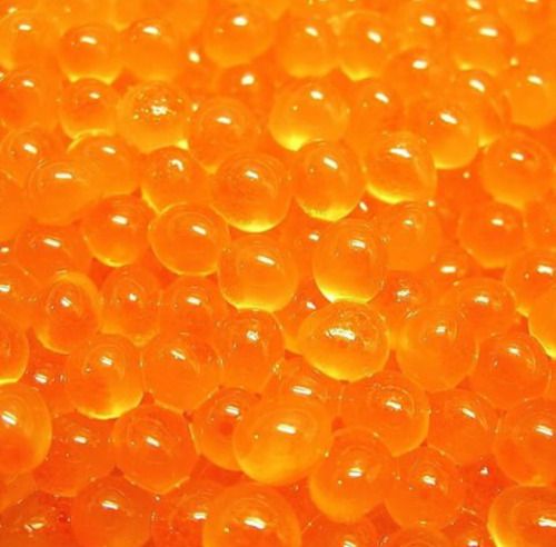 an orange background with lots of round beads