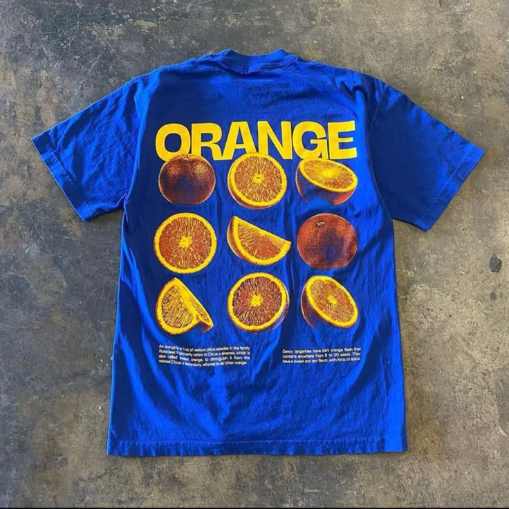 orange, blue t-shirt with oranges, different t-shirts with cool prints, currently fashionable t-shirts, converse, carhartt, timotée chalamet Tee Shirt Outfit, Style Parisienne, Mode Hippie, Shirt Design Inspiration, Orange T Shirts, Orange Shirt, Orange Flower, Mode Inspo, 가을 패션