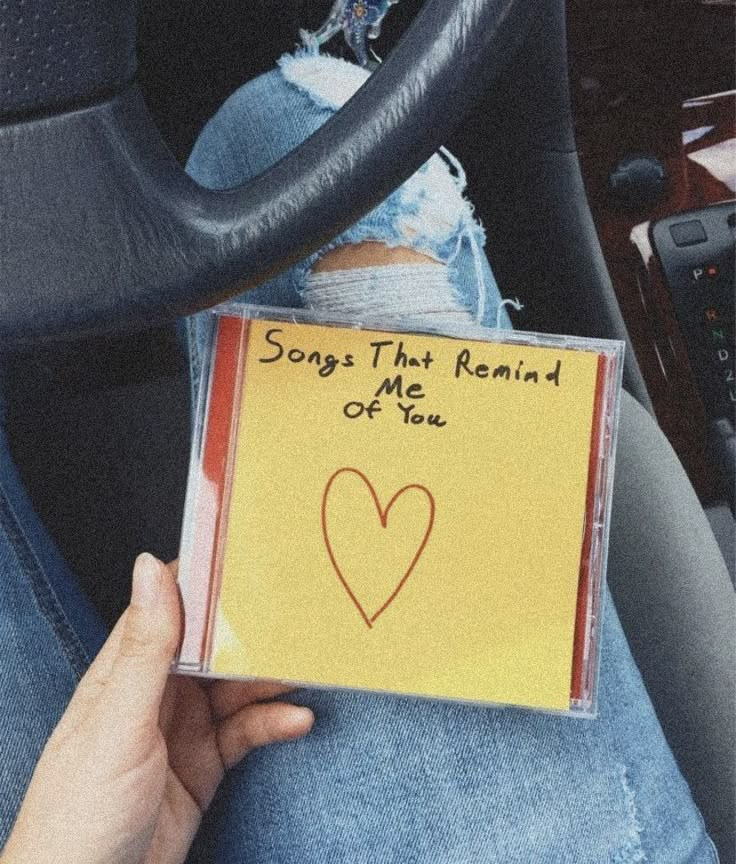 someone is holding up a note that says, songs that remind me if you love them