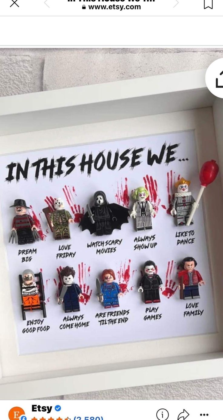 a framed poster with the words in this house we are surrounded by legos and toys