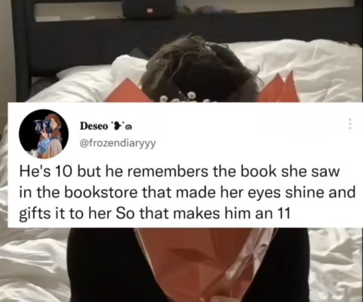 a person laying in bed with an envelope over their head and the caption reads he's 10 but he remembers the book she saw in the bookstore that made her eyes shine