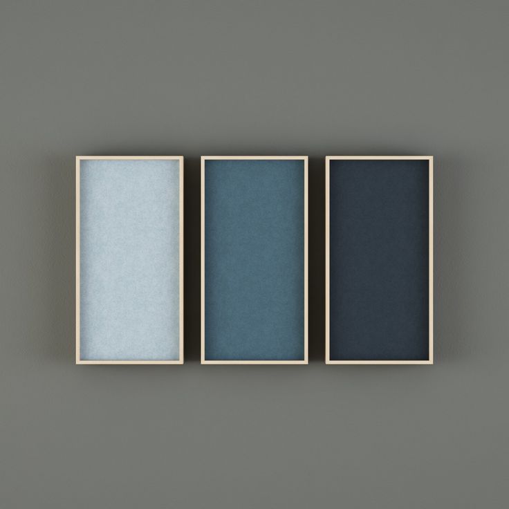 three different shades of blue and grey on a gray background, each with an empty box