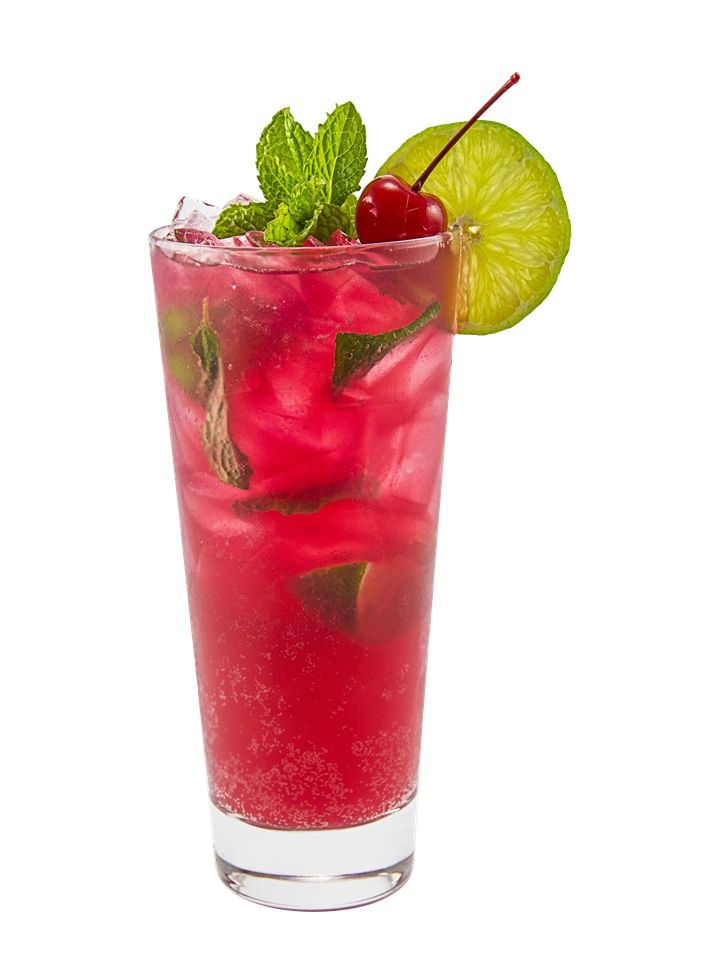 a tall glass filled with red liquid and garnished with green leaves, cherries, and a lime