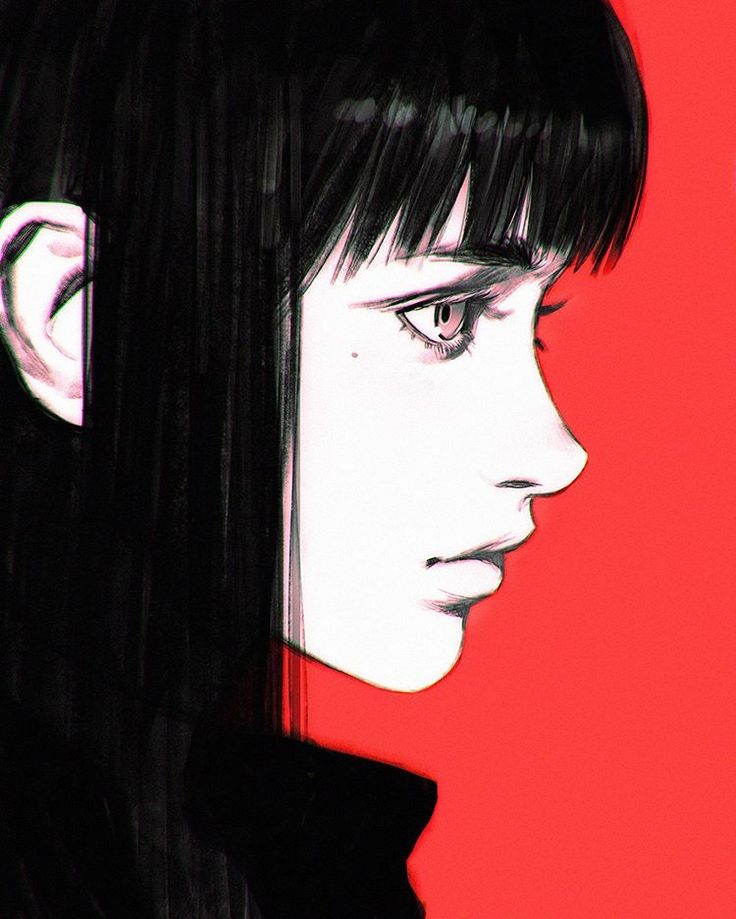 a woman with black hair and bangs is looking to the side while she's in profile