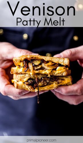 a person holding a sandwich in their hands with the words venison patty melt on it