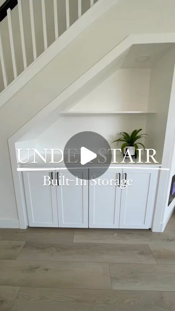 the under stair built - in storage area is clean and ready for us to use