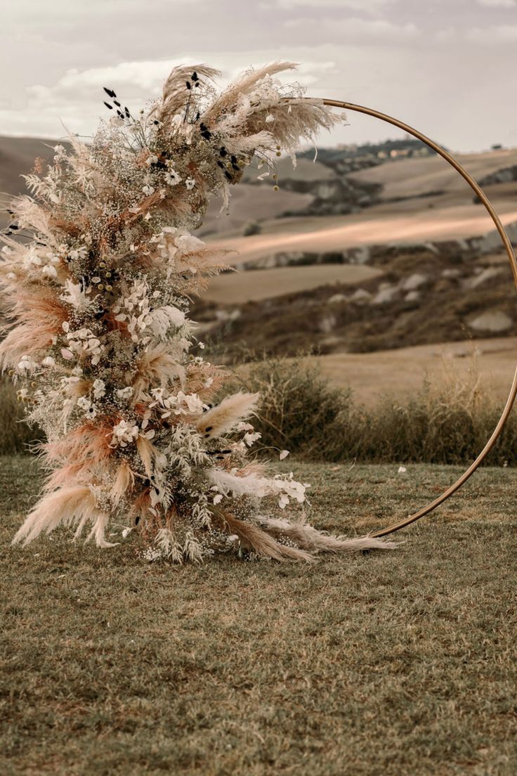 an artistically decorated hoop in the middle of a field