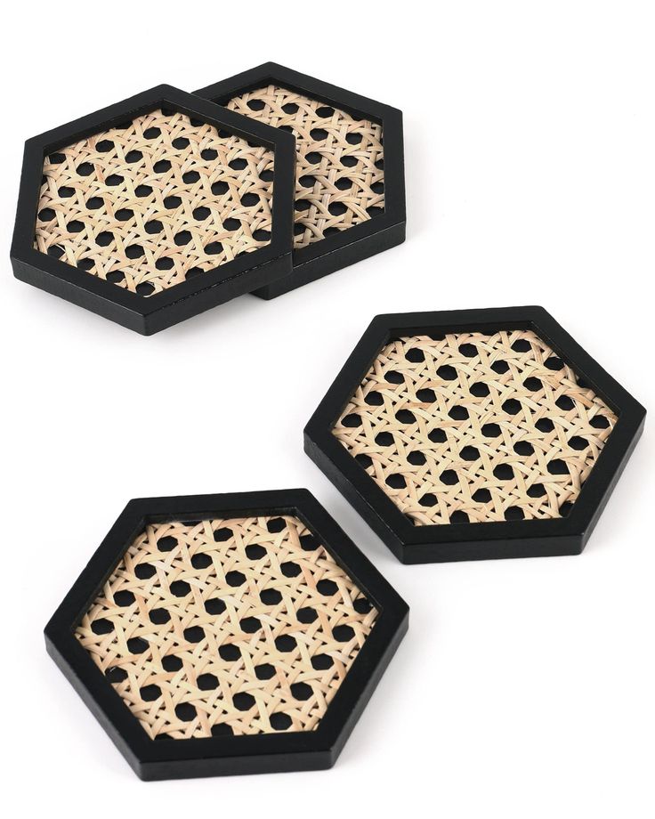 three black and gold hexagonal trays with holes on the sides, set of 3