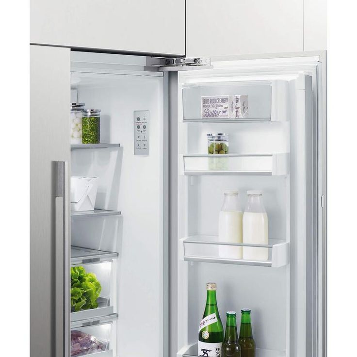 an open refrigerator with its door wide open