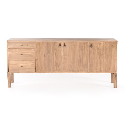 the sideboard is made from wood and has two drawers, one with three doors