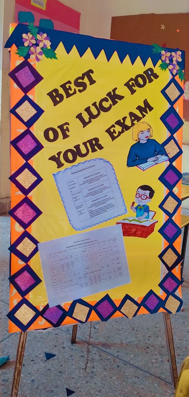 a sign that says best of luck for your exam with pictures of children on it