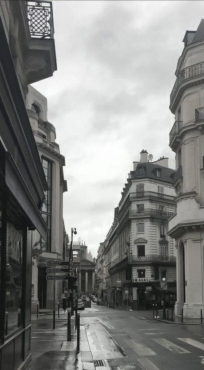 a black and white photo of an empty street