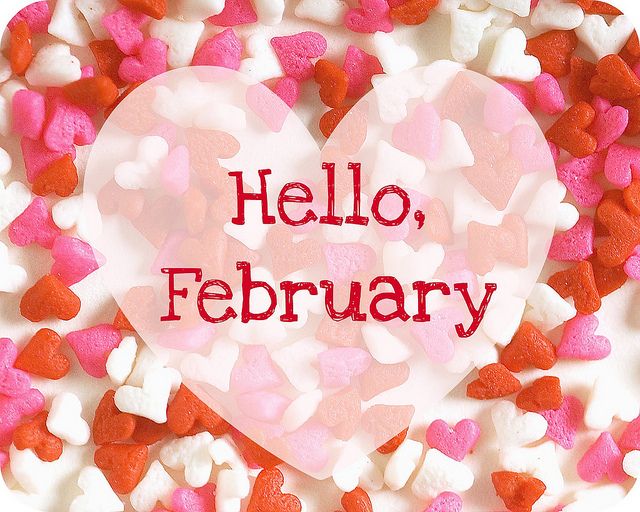 a heart surrounded by small hearts with the words hello, february written on it in red and white