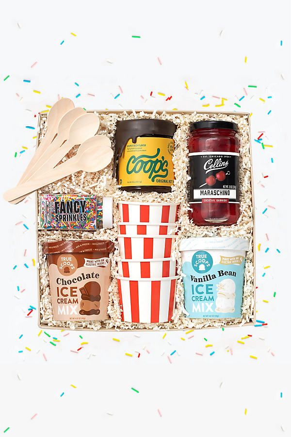 a box filled with confetti, ice cream and other items