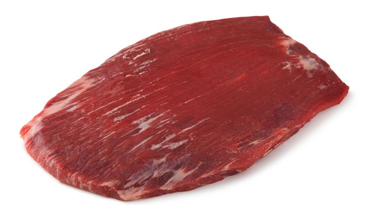 a piece of raw meat on a white background