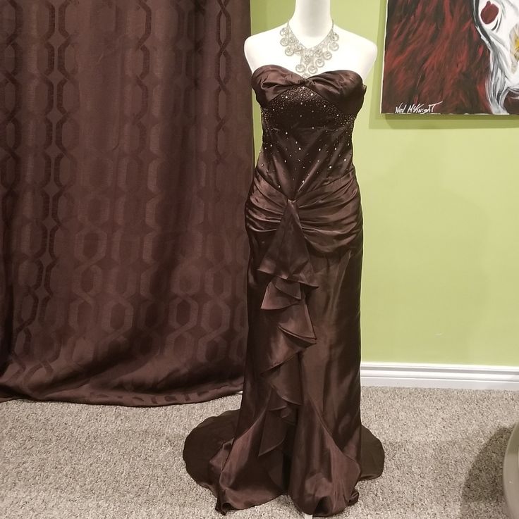 Chocolate Brown, Strapless, Formal Beaded Dress By Nox Has Sequin, Crystals, Ruffles And A Train. Size: Small, However, The Dress Have Been Altered To Fit A Size 3-4, 34b, 5'2 Build. Mannequin Size: 2-4. There Are Some Slight Marks On Different Parts Of The Dress Which Might Be Due To Wearing Greasy Body Cream, Which Can Be Seen In The 4th And 5th Photos, But It's Difficult To See. The Dress Can Be Zipped All The Way Up But I Did Not Want To Force It. Materials: 100% Polyester Care Instructions: Dry Clean Only Tvd Dresses, Dress With Ruffles, All The Way Up, Dresses Formal, Beaded Dress, A Train, Body Cream, Chocolate Brown, Ruffles