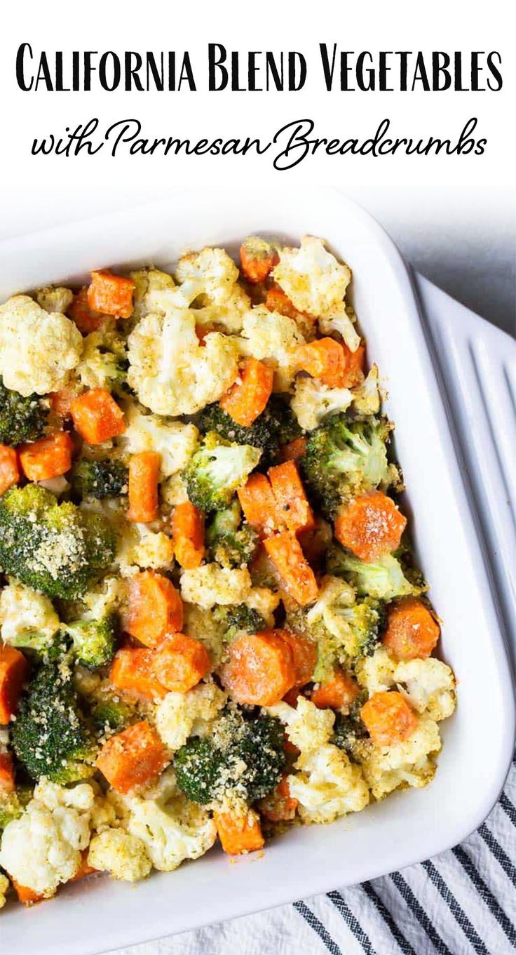 a casserole dish with broccoli, cauliflower and carrots