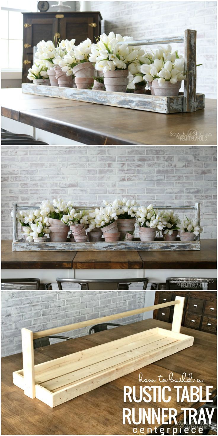 some flowers are in pots on top of a wooden shelf and the bottom is filled with potted plants