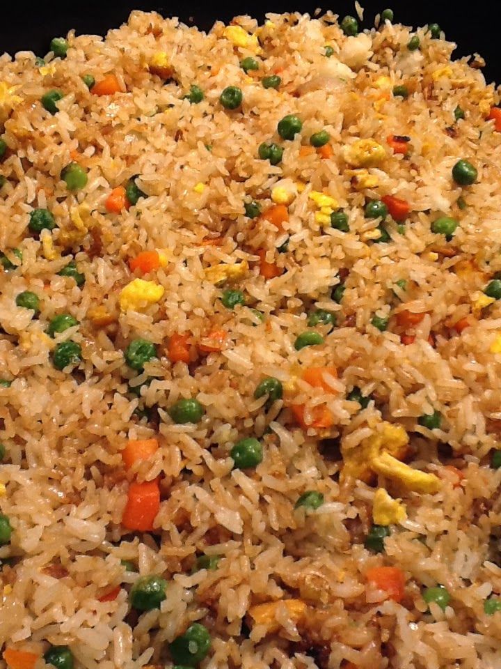 rice and peas are mixed together in a dish