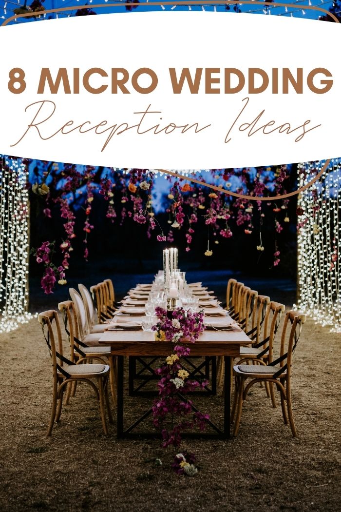 a table set up with flowers and candles on it for a wedding reception in the desert