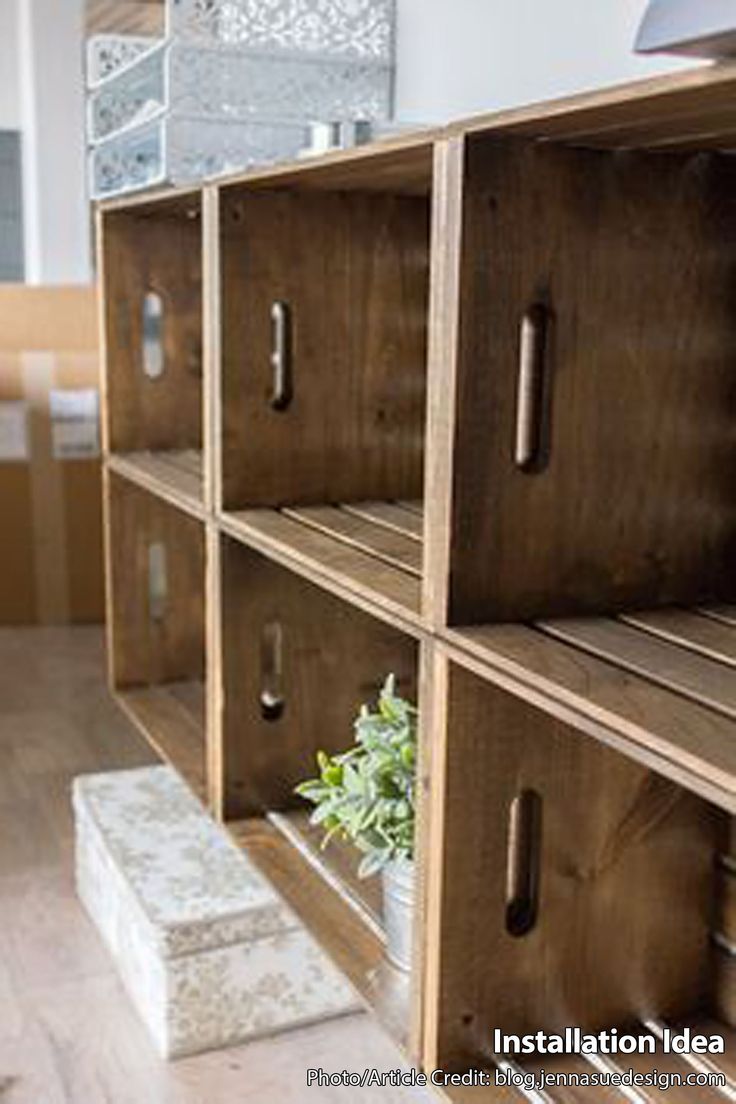 the shelves are made out of wood and have drawers on each side with plants in them