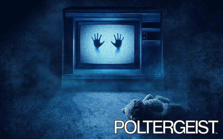 a teddy bear is sitting in front of a tv with the word poltergest on it