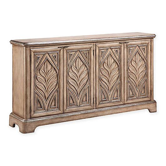 an antique style sideboard with carvings on the front and sides, made out of wood