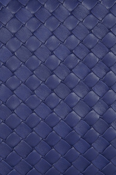 a blue leather texture with woven lines