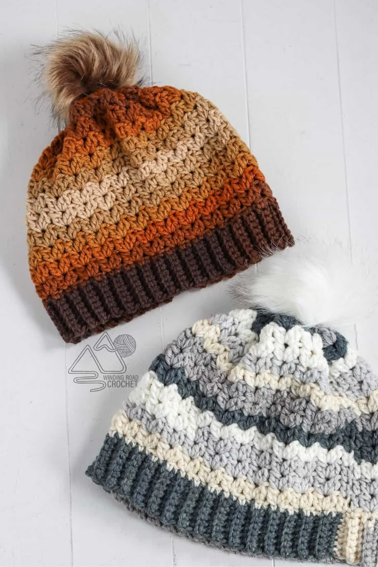 two crocheted hats sitting next to each other