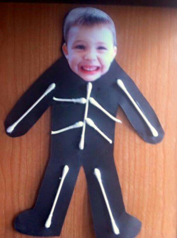 a cardboard cut out of a child's body