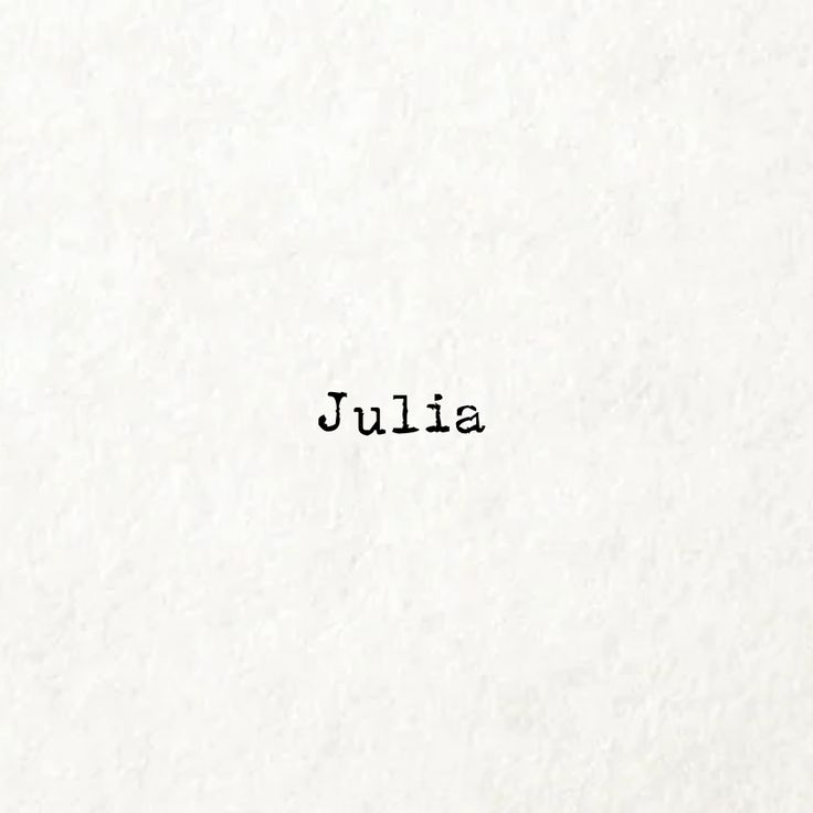 the word julia written in black ink on white paper