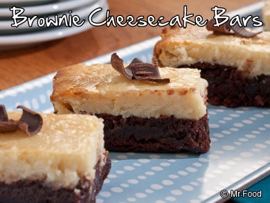 four pieces of cake sitting on top of a blue plate