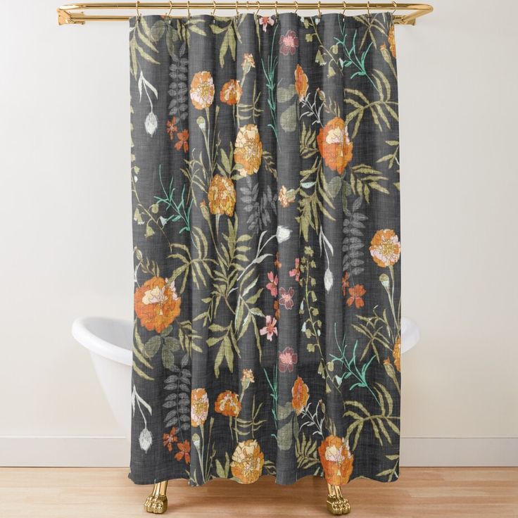 a shower curtain with flowers and leaves on it in a bathroom next to a bathtub