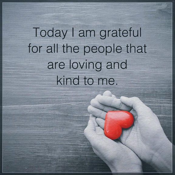 two hands holding a heart with the words today i am grateful for all the people that are loving and kind to me