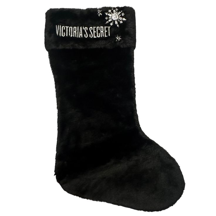 a black christmas stocking with the word victoria's secret written in white on it