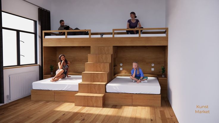 two people sitting on bunk beds in a room with wood flooring and white walls