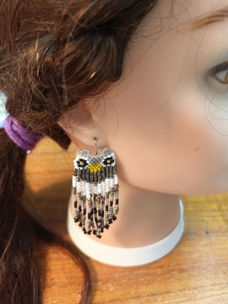 This is a hand beaded pair of eye catching earrings that are sure to draw lots of compliments. As beads are never exactly the same size and shape, it makes every pair one of a kind. These were produced in a smoke free environment. Beaded Owl Earrings, Beaded Owl, Owl Earrings, Hand Beading, Beaded Earrings, Jewelry Earrings Dangle, To Draw, Etsy Earrings, Etsy Accessories