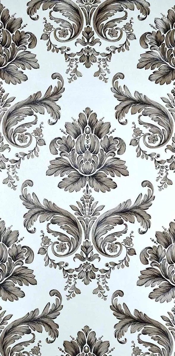 an ornate wallpaper with black and white designs on the back ground, in shades of grey