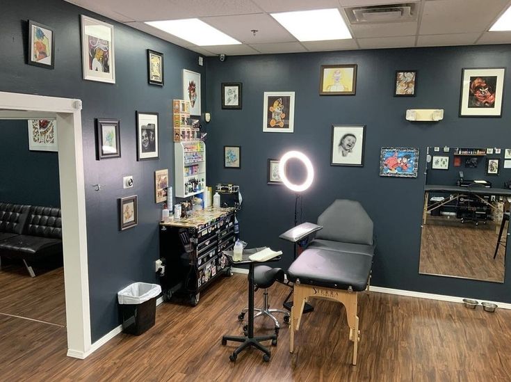 a salon with chairs, mirrors and pictures on the wall