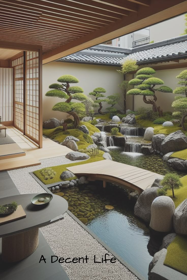 a japanese garden with rocks and trees in the center, along with a bridge over a small pond